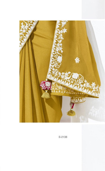 Mustard Yellow Georgette Saree with White Thread Embroidery & Floral Blouse